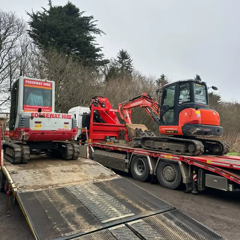 Transporting Diggers and Rollers